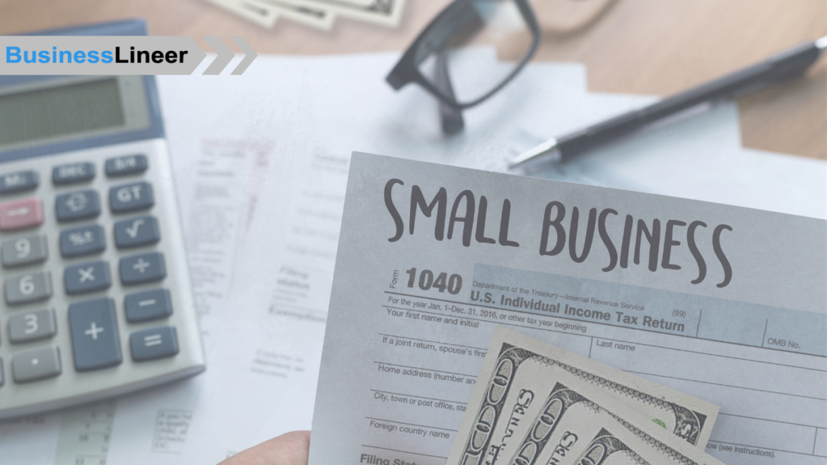 A person organizing tax documents at a desk, representing small business tax filing preparation.